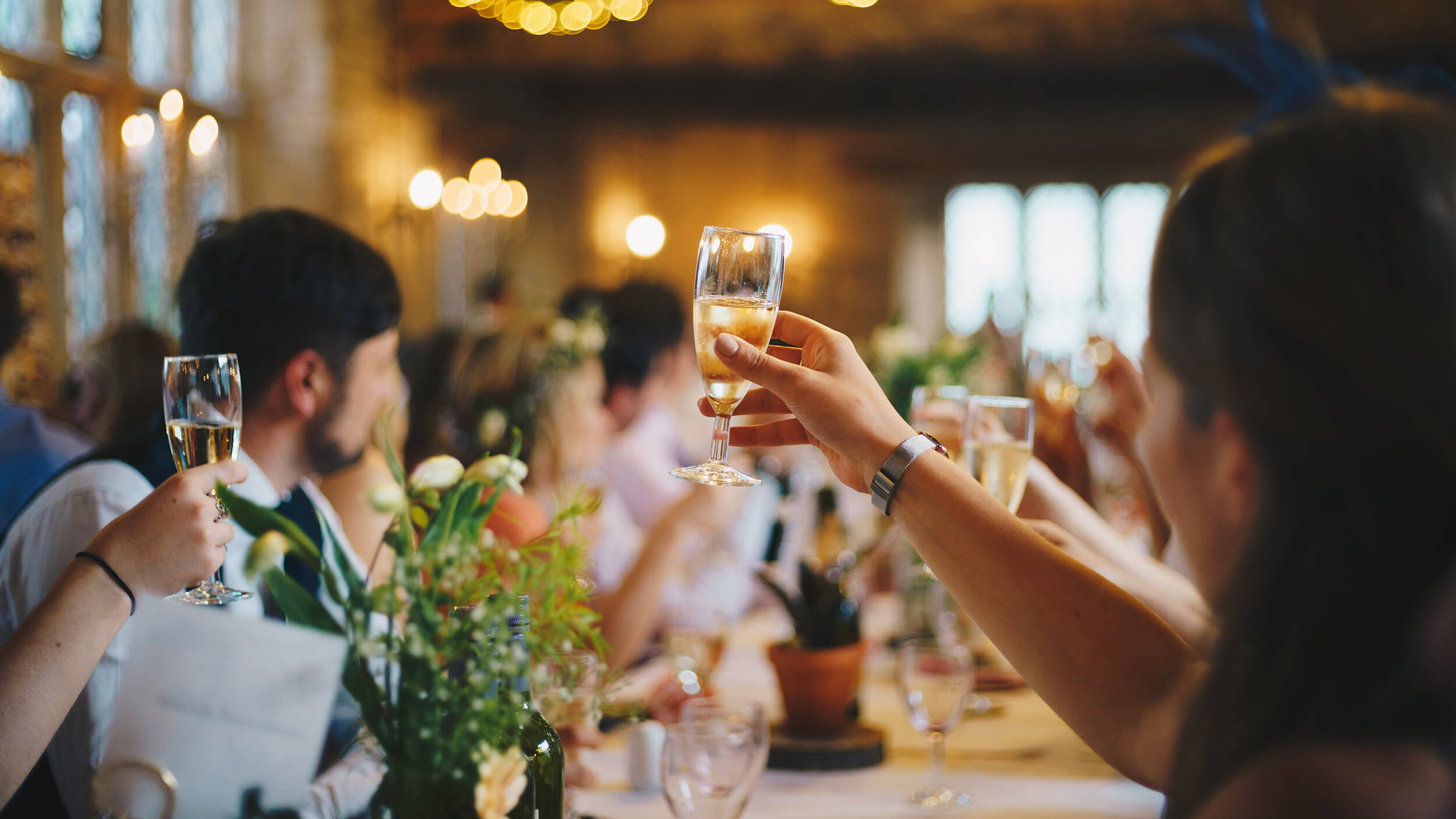 sparkling wine toast during wedding reception