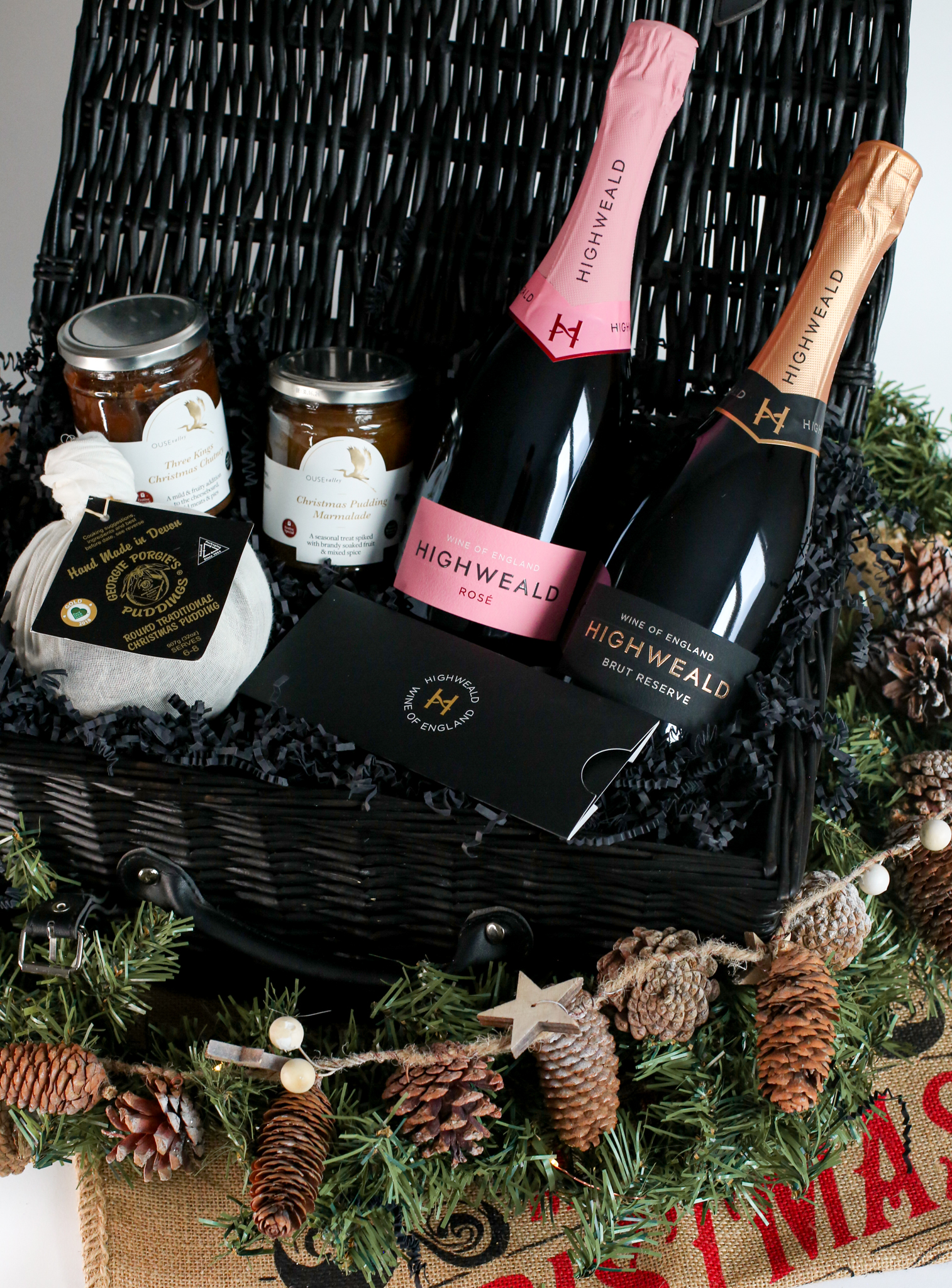 Christmas hamper with sparkling wine bottles