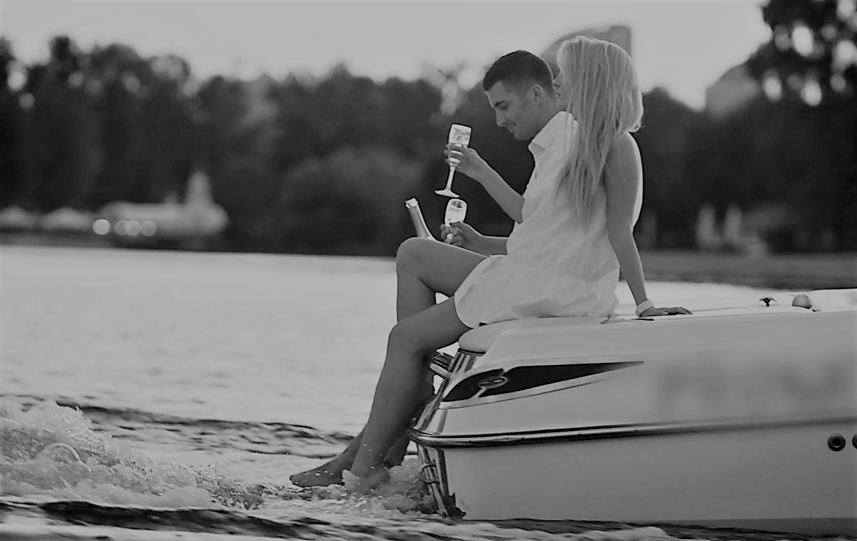 couple drinking wine on boat